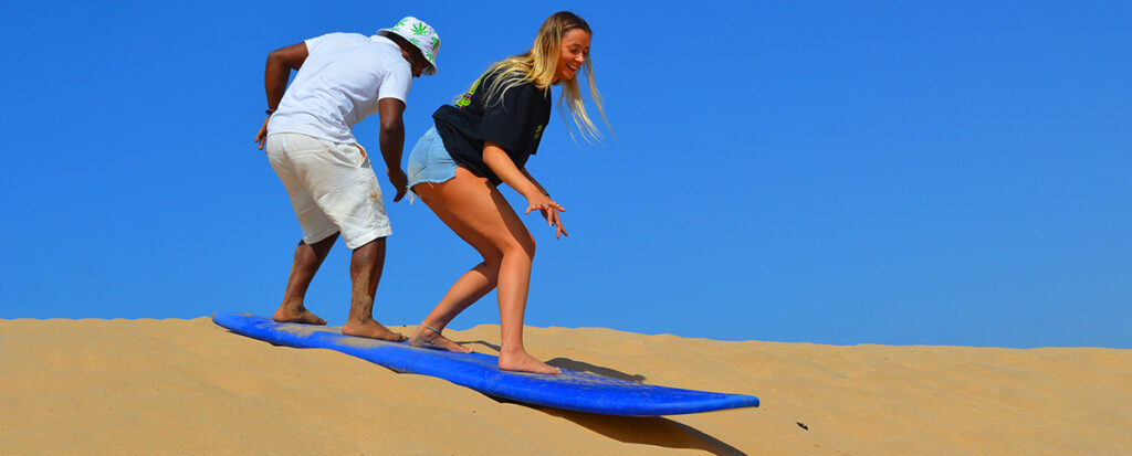 Sandboarding desert dubai